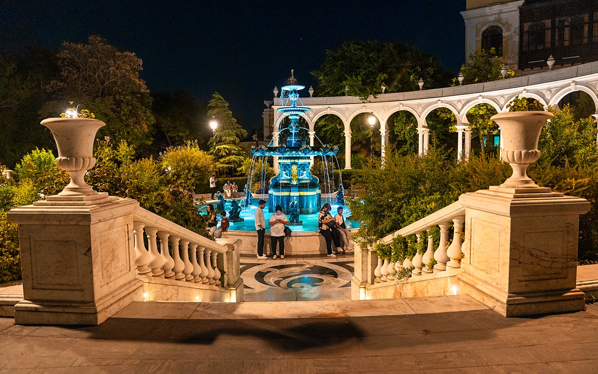 Hotel courtyard with fountain at night