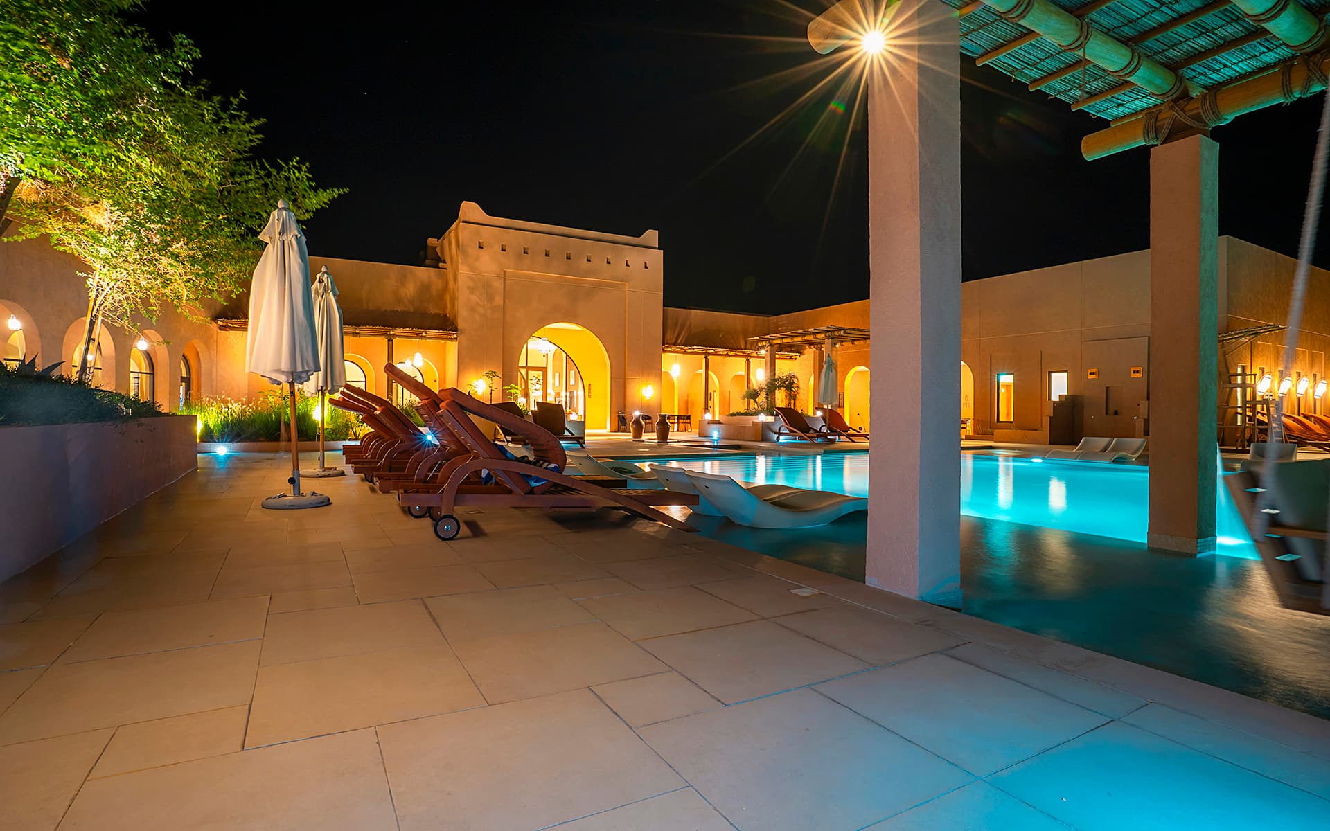Resort pool through archway